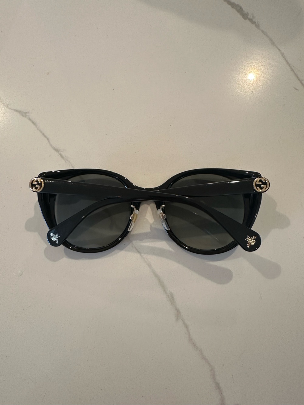 Gucci Black Round Logo Temple Sunglasses with Gold Accents